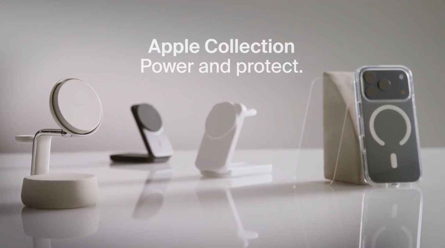 Belkin Apple Collection products including MagSafe charging stands and a clear MagSafe iPhone case displayed on a white surface with the text “Apple Collection – Power and protect.